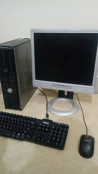 old PC of Dell company ,mouse Lenovo ,keyboard Dell, screen:HANNS. G