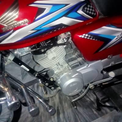 Honda 125 good condition total januion colour blue