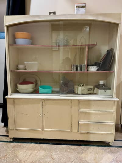 wooden kitchen showcase with glass
