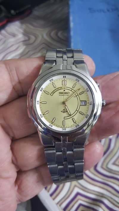 Seiko Kinetic Sports Japan made cell weak hai watch is ok.