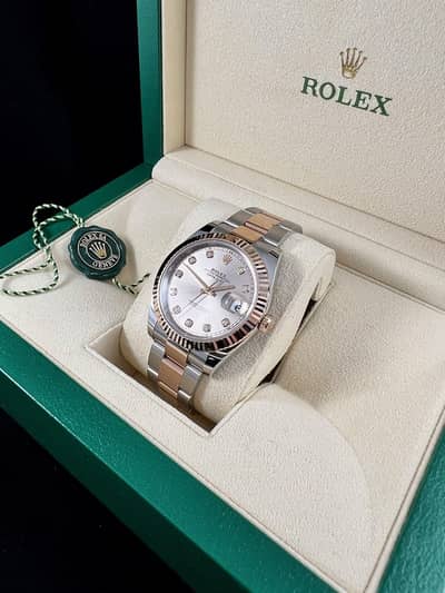 Rolex white diamond watch.