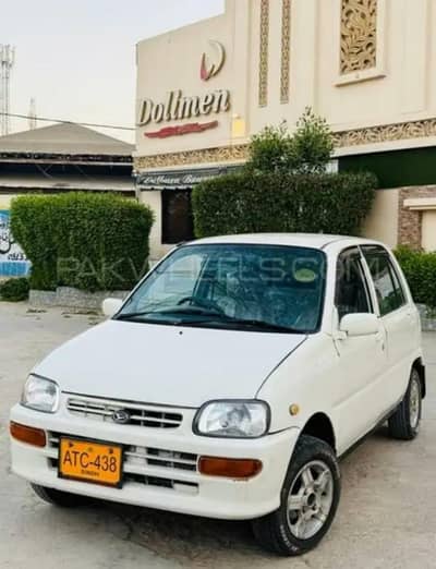 Daihatsu Cuore 2010 White – AC Chill – LCD & Sound System – Alloy Rims