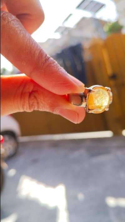 five carat pukhraj yellow sapphire