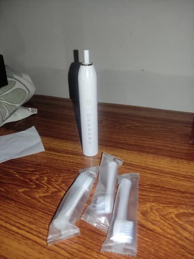 6 mode sonic cleaning electric toothbrush.