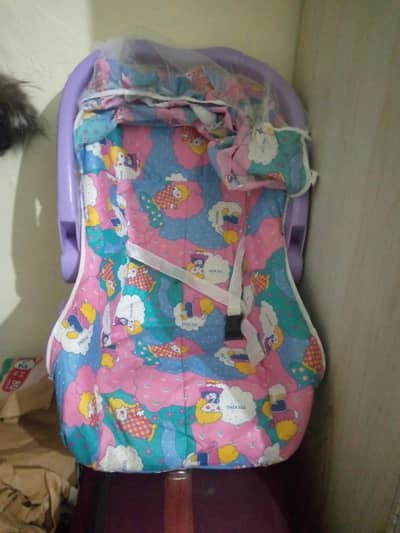 newborn baby carrycot.