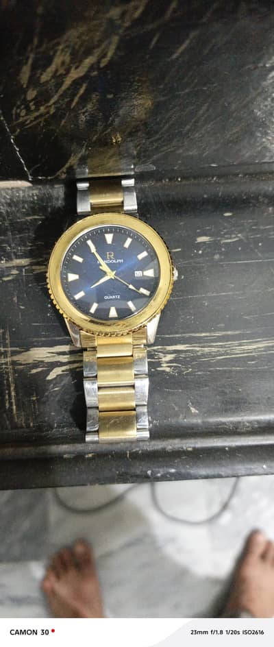 Gold watch 2500  and black watch 1500