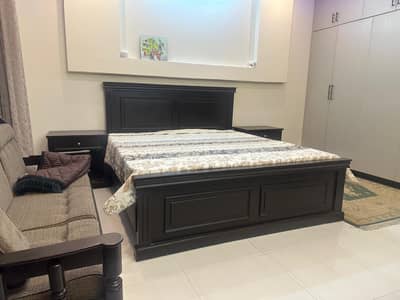complete wooden bed with dressing and side tables