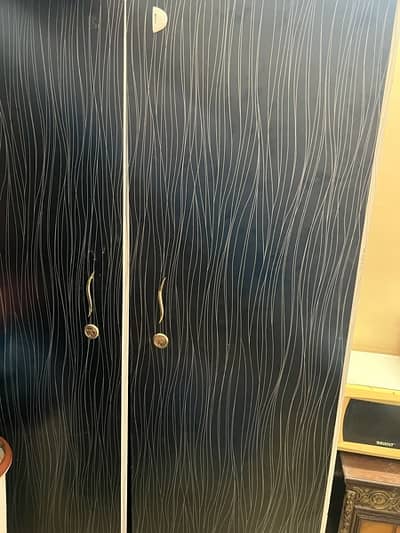 Selling my 2 door spacious wardrobe have separate sections