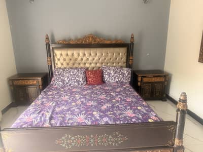 Bed set along with side tables and mirror. Mattress not included