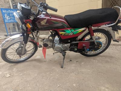 Urgent sale Honda 70 21/22 band new tyar lash Condition
