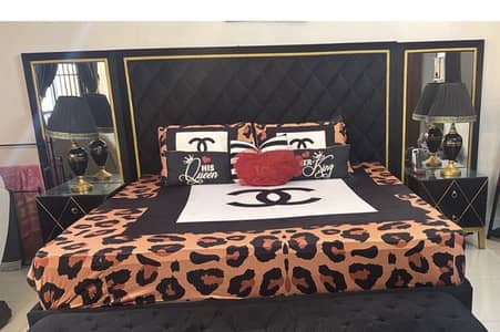 New bed along with side table and dresser