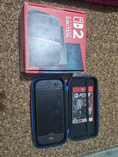 Nintendo Switch 2 console with FIFA game