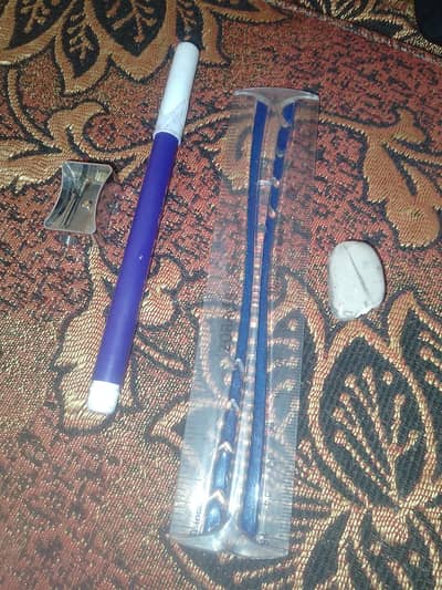 purple marker with scale,shopper and eraser