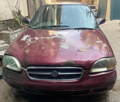 Suzuki Baleno 2006 – Red Color – For Sale