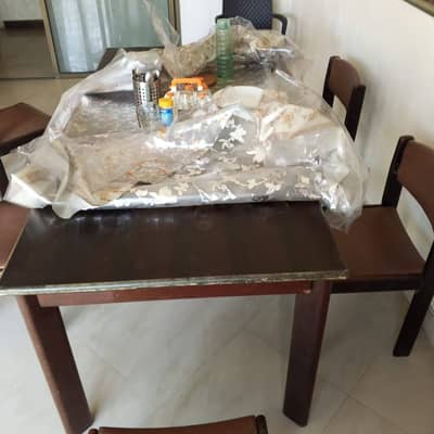 Brown Wooden Dining Table with 5 Chairs – Good Condition