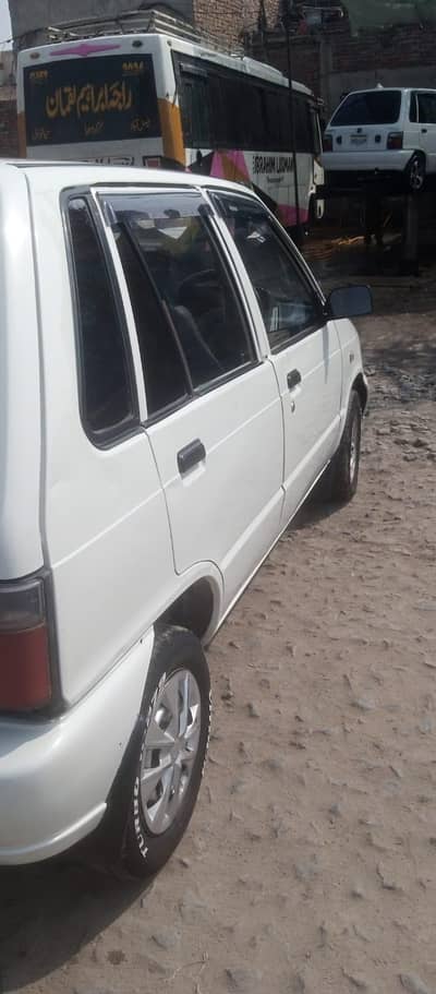 Suzuki mehran 2018 model White color AC working mechanical good. 20 KM