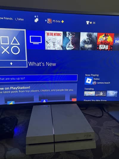 PS4 with 2 Controllers + Games + PS Plus Time Left