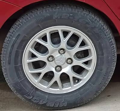 Original OEM Alloy Rims — Mitsubishi Lancer 2004