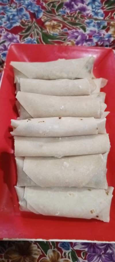 Fresh Homemade Uncooked Chicken Roll Samose Available