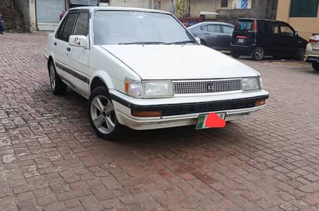 Toyota Corolla 86. (EFI engine)AC / CNG. 25 KM average. family use