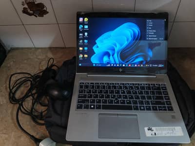 hp Elite book with one office chair free