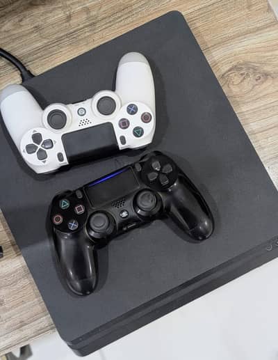 PS4 Slim 3TB 10/10 With 2 Controllers 50 Games