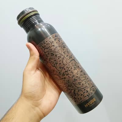HYGGE 1L Pure Copper Ayurvedic Water Bottle with an Engraved Design