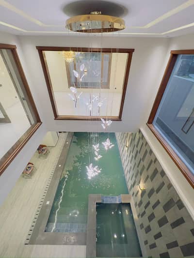 DEFENCE BRAND NEW 500 YARDS BUNGALOW FOR RENT SWIMMING POOL FULL BASEMENT