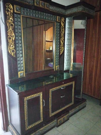 A wooden Dresser Drawer.