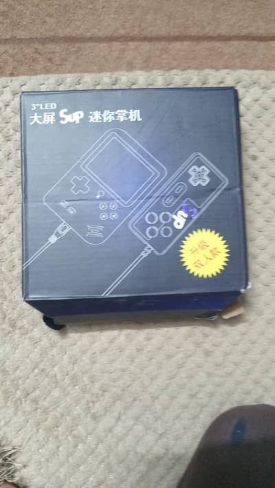 1 console 1 remote 1 tv cable 1 charging cable sup gaming controller