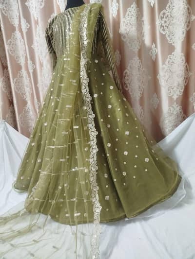 Stitched Net Umbrella frock (medium size )  with sequence embroidery.