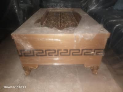 Golden color sofa table brand new