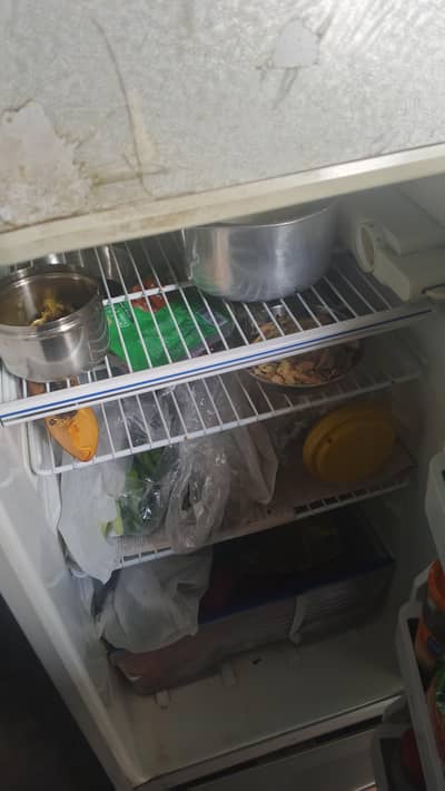 home used refrigerator for everything is working is a good condition