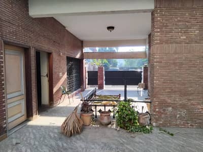 26 Marla Single Storey Facing Park Semi Commercial House Is Available For Sale In Garden Town Aurangzaib Block Lahore