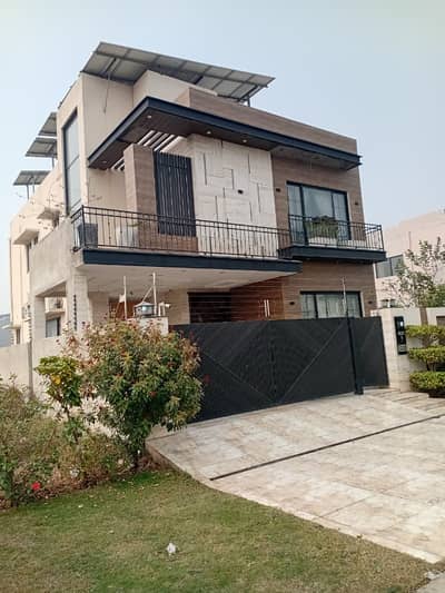 10 Marla Slightly used Like Brand New Eye Catching Modern Design Full Basement Bungalow Demand 495Lac
