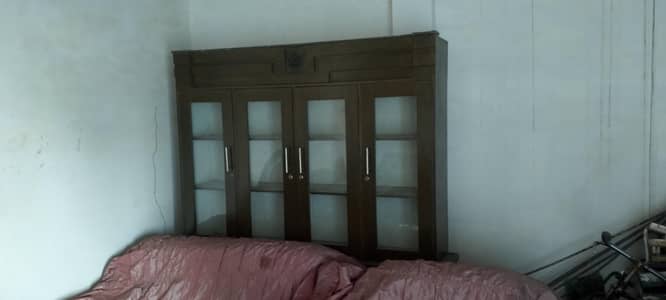 bed and side tables and dresson showcase and dewan