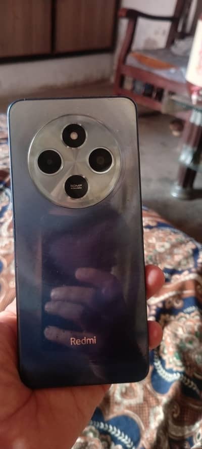 final price 26000 redmi 14c 6+6=128. genuine 26 march 2026 warranty