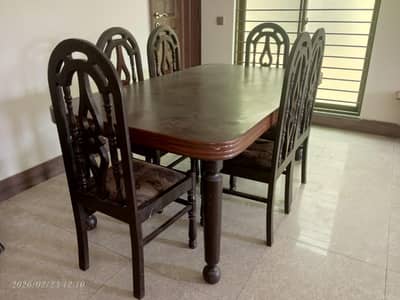 Dining table with 6 chairs for sale.
