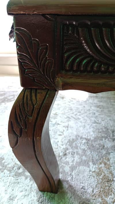 Takhat- wooden daybed, low-height bed, or a large wooden bench