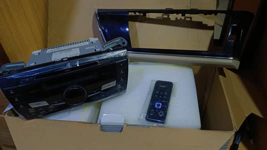 Toyota Corolla GLi Genuine Clarion Audio Panel / Stereo System