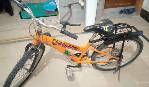“Kids Bicycle with Support Wheels – Good Condition”