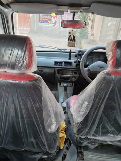 mehran B2B 2002 model white colour new seats, urgent sale