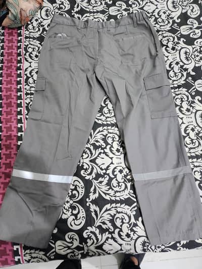 Reflective Cargo Pants or High-Visibility (Hi-Vis) Work Trousers.