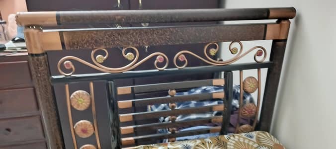 Beds with spring mattress.