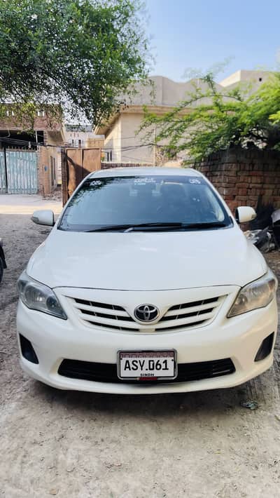 TOYOTA || COROLLA || XLI || 2009 || WHITE || CONVERT GLI