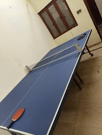 Table Tennis with rackets and Net