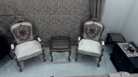 Chair with center table and brand price is negotiable cont03219900051