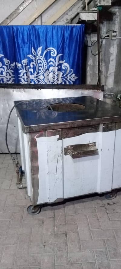 2 Pera tandoor (metal oven)