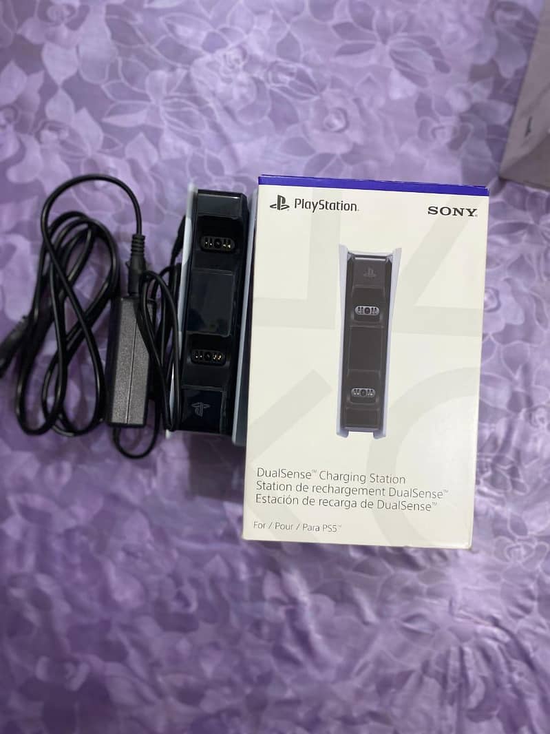 ps5 used with extra wireless controller. . controller charging station 5