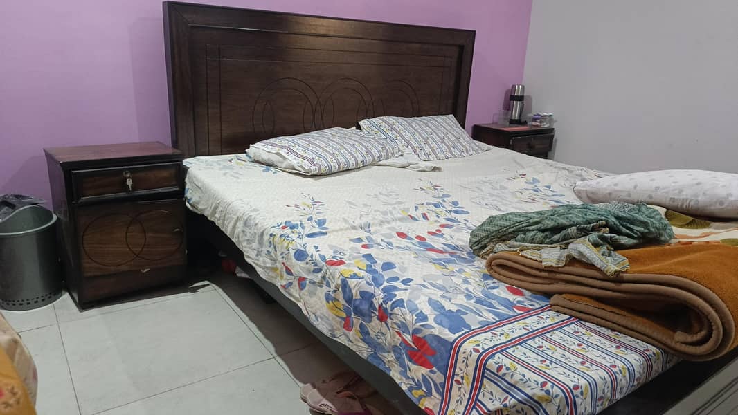 double bed with side table 0